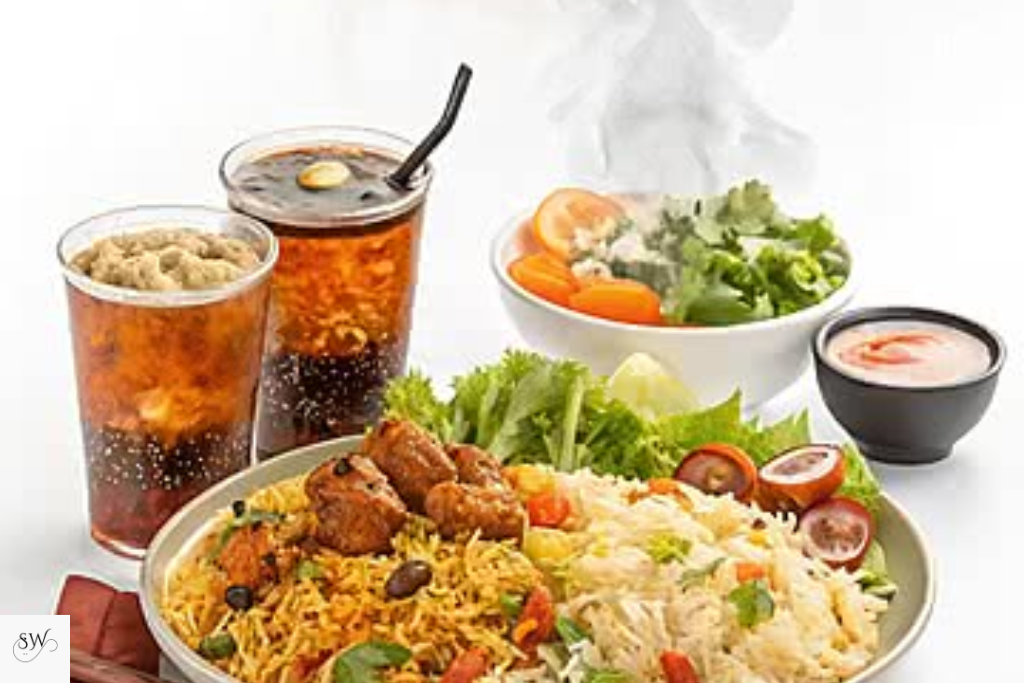 serving chicken biryani